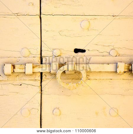 Cross   Brass Brown Knocker  Closed Wood Door  Tradate Varese