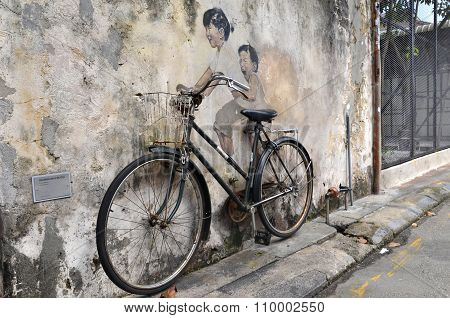 Little Children On A Bicycle Street Art Mural By Lithuanian Artist Ernest Zacharevic