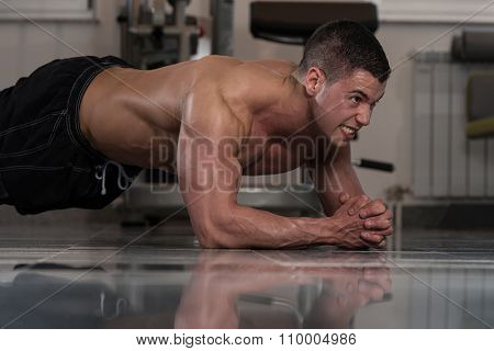 Healthy Man Doing Abdominal Excerise On Foor