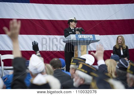 NEW YORK - NOV 25 2015: Rear Admiral Cynthia M. Thebaud, Commander, Expeditionary Strike Group 2 speaks to the audience at the Intrepid Sea, Air & Space Museum wreath laying ceremony on Veterans Day.