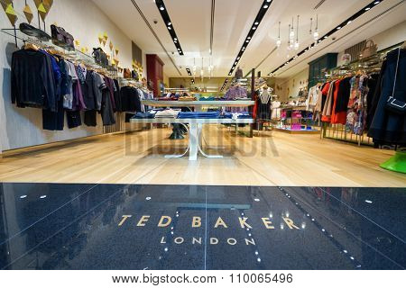 SINGAPORE - NOVEMBER 08, 2015: interior of Ted Baker store. Ted Baker plc is a British luxury clothing retail company