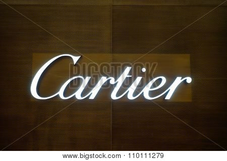 SINGAPORE - NOVEMBER 08, 2015: Cartier inscription. Cartier designs, manufactures, distributes and sells jewellery and watches. Founded in Paris.