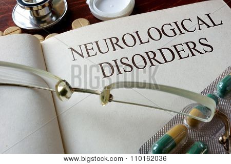 Book with diagnosis neurological disorders.