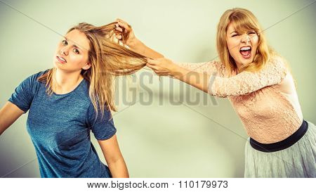 Aggressive Mad Women Fighting Each Other.