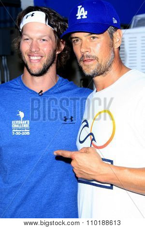 LOS ANGELES - JUL 30:  Clayton Kershaw, Josh Duhamel at the Clayton Kershaw's 3rd Annual Ping Pong 4 Purpose at the Dodger Stadium on July 30, 2015in Los Angeles, CA