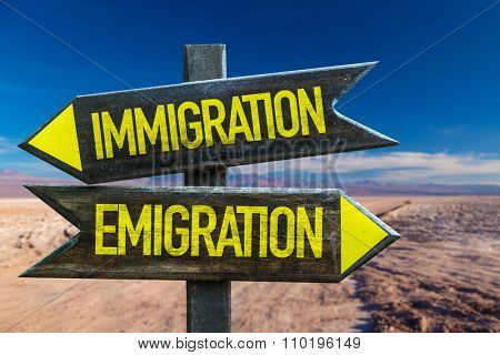Immigration - Emigration signpost in a desert background