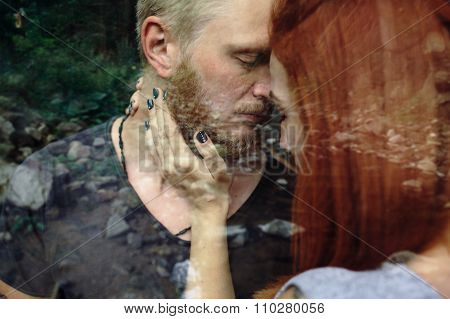 beautiful couple on the background of forest