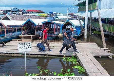 Passengers Leaving A Boat