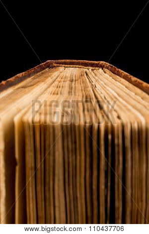 Ancient Book Shot On Black Background