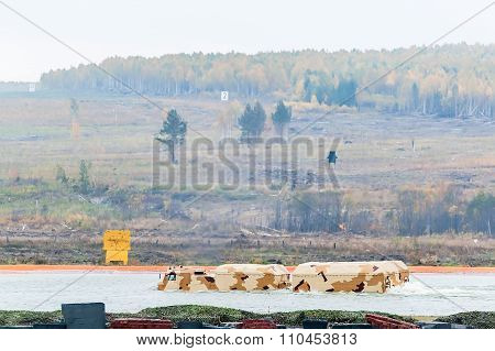 Tracked carrier DT-30P1 moves in water. Russia