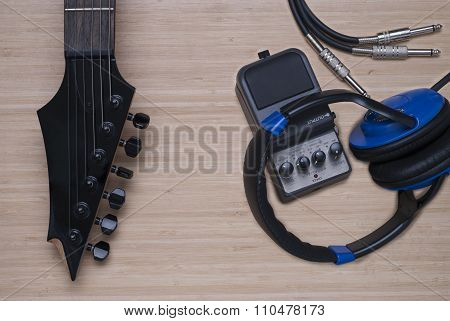 Electric Guitar, Headphones And Distortion Unit