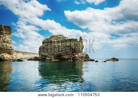 View From The Sea On A Rocky Shore