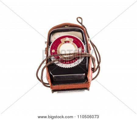 Old exposure meter in leather case.