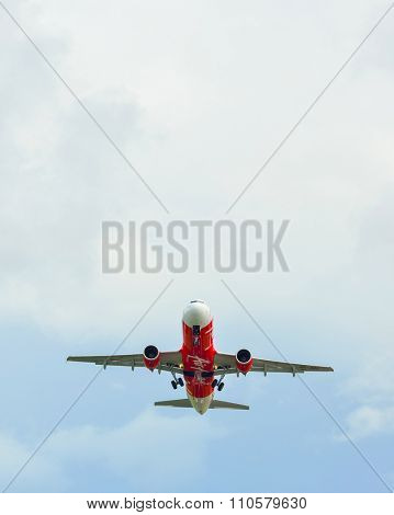 PHUKET, THAILAND - NOVEMBER 06, 2015: AirAsia Airbus A320 take-off. AirAsia Berhad is a Malaysian low-cost airline headquartered near Kuala Lumpur, Malaysia
