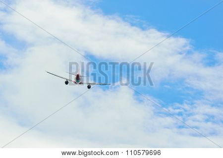 PHUKET, THAILAND - NOVEMBER 06, 2015: AirAsia Airbus A320 take-off. AirAsia Berhad is a Malaysian low-cost airline headquartered near Kuala Lumpur, Malaysia