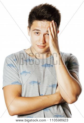 young attractive man isolated thinking emotional on white close up gesturing