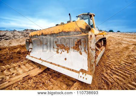 Close-up Of Bulldozer Blade, Industrial Machines Working In Sandpit