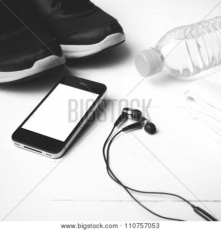 fitness eqiupment:running shoes water bottle towel smart phone black and white color style