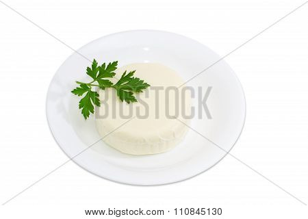 Mozzarella Cheese On A White Dish