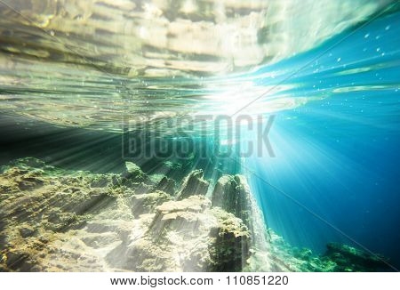 underwater world on wave background