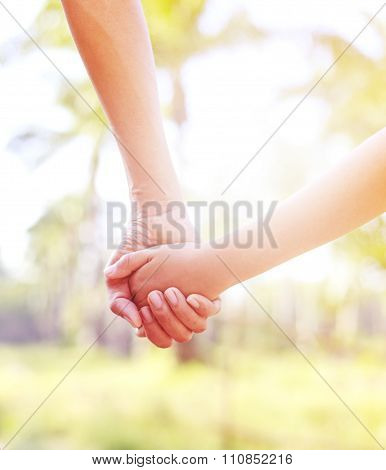 Helping Hands - Father Hoding Son Hand