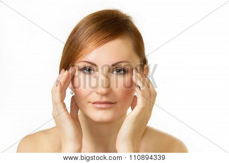 Face Of The Beautiful Young Woman On A White Background
