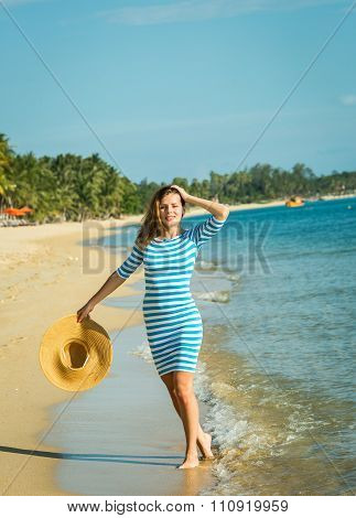 Happy Woman Enjoying Beach Relaxing Joyful In Summer By Tropical Blue Water. Beautiful Model Happy O