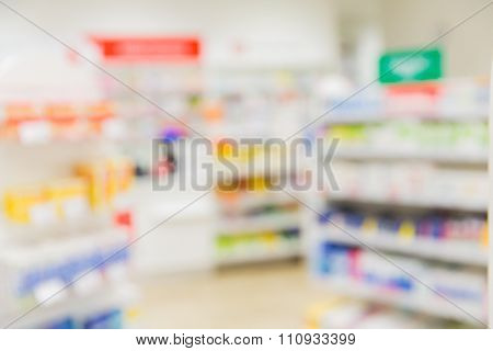 medicine, pharmacy, health care and pharmacology concept - pharmacy or drugstore room blurred background