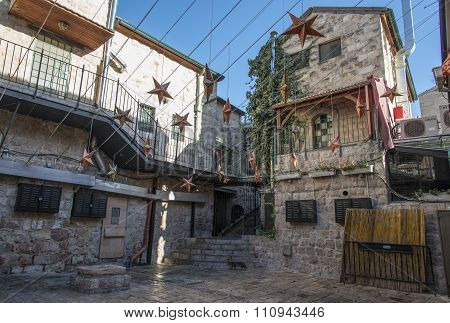 Stars hanging at a street in Nahalat Shiv'a, Jerusalem, Israel