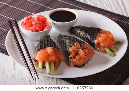 Japanese Salmon Temaki Sushi, Ginger And Sauce Closeup. Horizontal