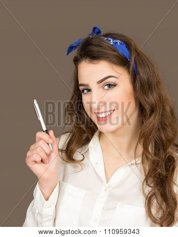 The Young Woman Holds In Hand Pen
