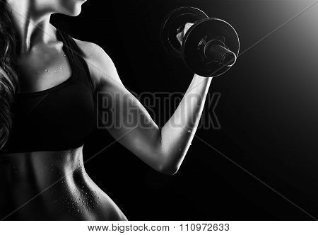 Female Muscular Arms With Dumbbells