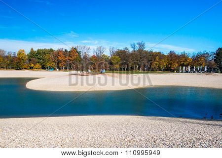 Bundek lake in Zagreb, Croatia, in autumn, blue sky