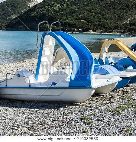 Water sports equipment on the lake Castillon in France. Lake Castillon is a reservoir in Alpes-de-Haute-Provence in France.