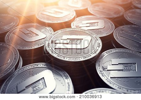 Dash coins in blurry closeup with sunburst from above. Dash coin growth concept. 3D rendering.