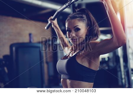 Sexy Athletic Young Girl Training Back In Gym