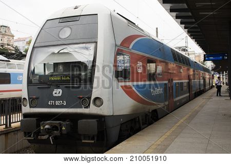 Czechia People And Foreigner Passengers Wait And To Get On The Train At Prague Main Railway Station