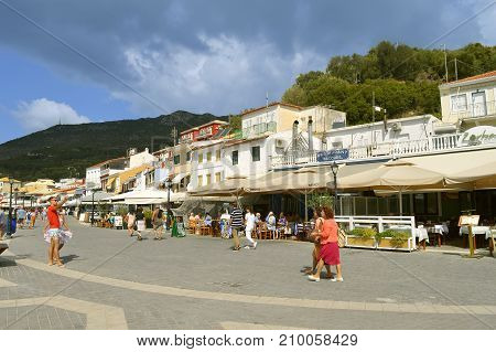 Paxos harbour Greece - October 01 2017 : Paxos tourist visiting the small island south of Corfu a Greek island in the Ionian sea