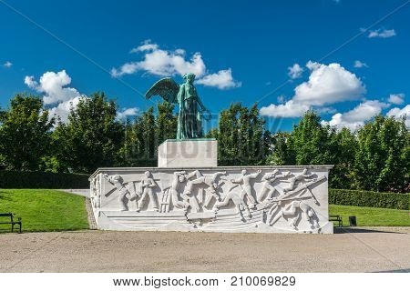 Copenhagen, Denmark - september 3, 2017: Sofartsmonumentet in Copenhagen (Maritime Monument) was Sculpted by Svend Rathsack (1885-1941). This statue is in the public domain because the sculptor died more than 70 years ago.