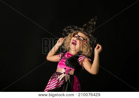 Attractive Girl In Witch Halloween Costume