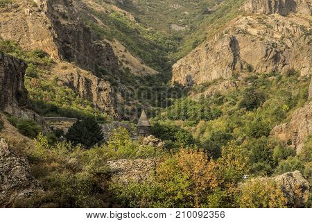 The ancient Christian temple Geghard in the mountains of Armenia