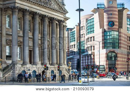 London, UK - March 15, 2017: Walking people in the City of London, Bank street.