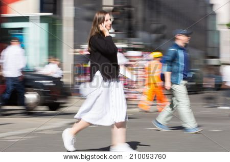 LONDON, UK - June 9, 2017: Blurred image of walking people at Oxford street, the main destination for shopping at Westend.