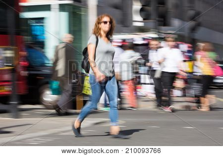 LONDON, UK - June 9, 2017: Blurred image of walking people at Oxford street, the main destination for shopping at Westend.