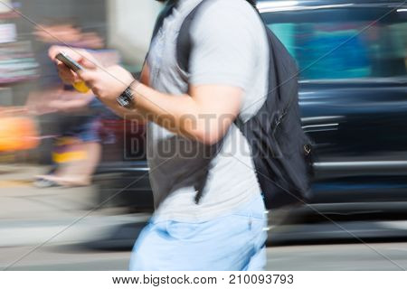 LONDON, UK - June 9, 2017: Blurred image of walking people at Oxford street, the main destination for shopping at Westend.