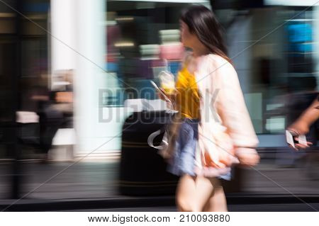 LONDON, UK - June 9, 2017: Blurred image of walking people at Oxford street, the main destination for shopping at Westend.