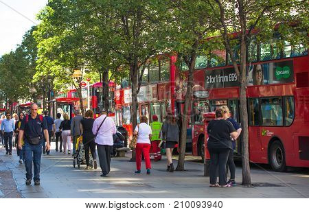 LONDON, UK - June 9, 2017: Blurred image group of walking people at Oxford street, the main destination for shopping at Westend.