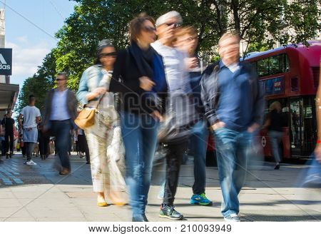 LONDON, UK - June 9, 2017: Blurred image group of walking people at Oxford street, the main destination for shopping at Westend.