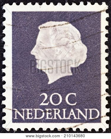NETHERLANDS - CIRCA 1953: A stamp printed in the Netherlands shows Queen Juliana, circa 1953.