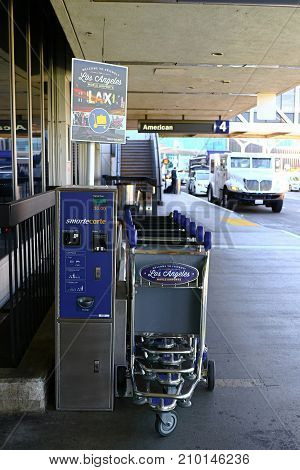 Los Angeles, USA - 06 October 2017 : SmarteCarte paying luggage carts a wait passengers at many airports throughout the United States in LAX.